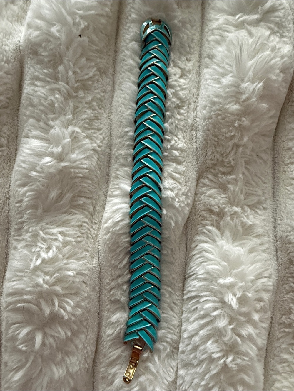 A vintage signed Kramer of New York turquoise enamel articulated link bracelet